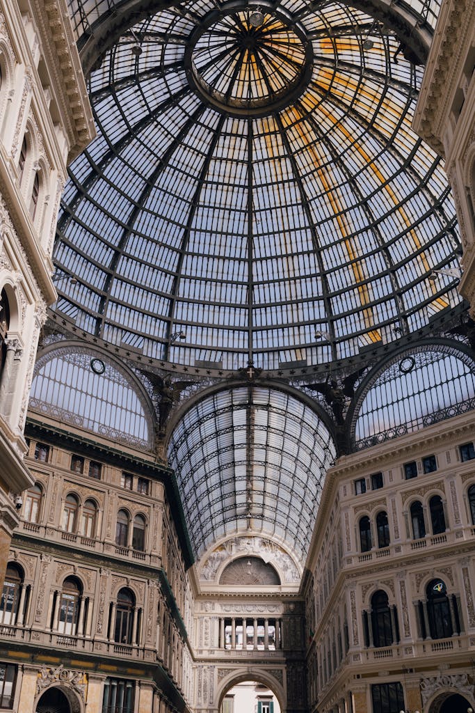 Explore the intricate architecture of Galleria Umberto I, a stunning landmark in Naples, Italy.